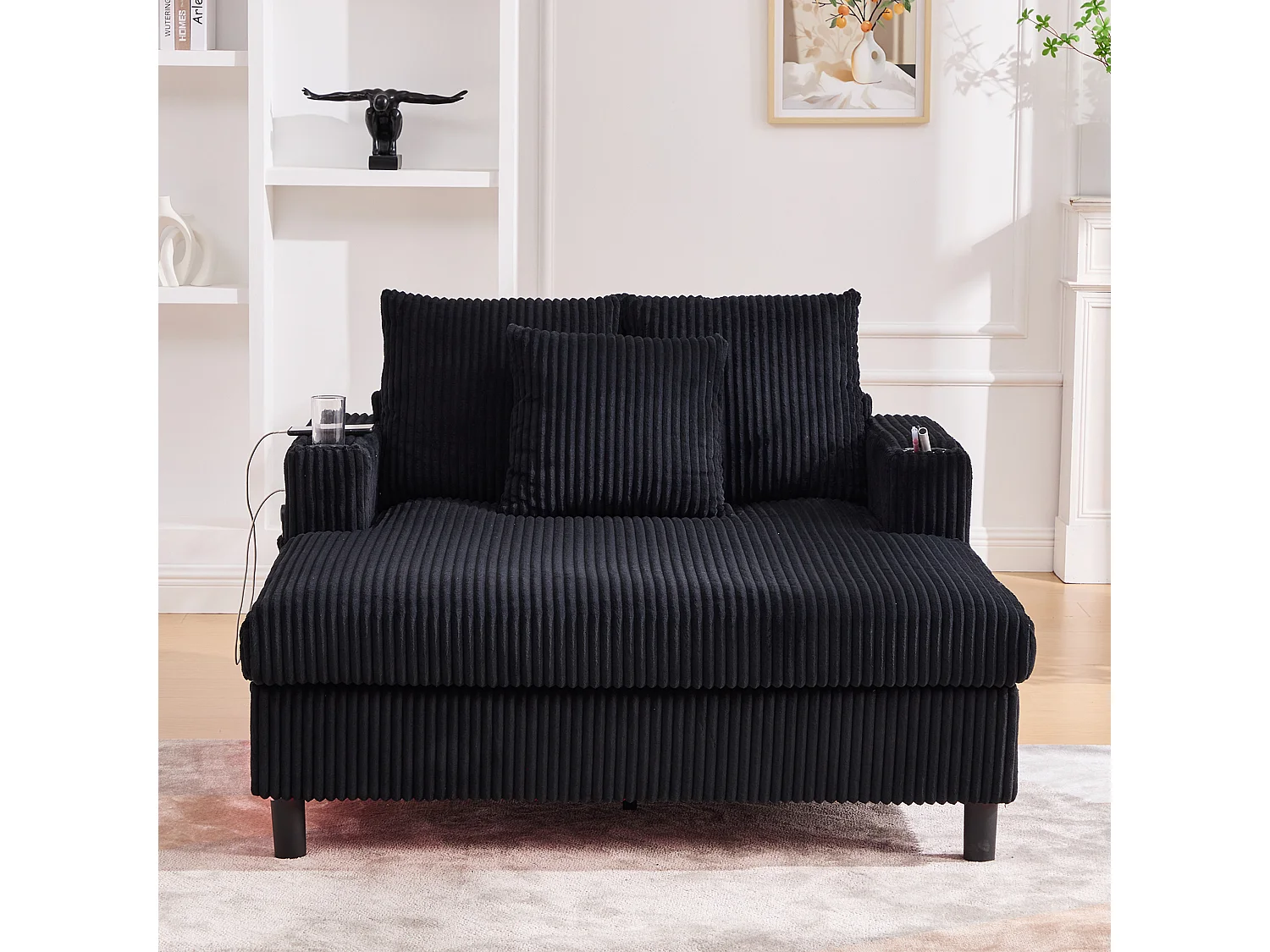 Divano lounge in peluche nero con porta USB, illuminazione LED e portabicchieri