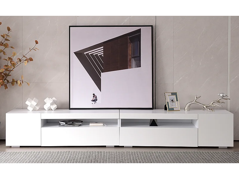 Meuble TV blanc 240 cm avec panneau brillant, éclairage LED variable. Design épuré et pratique, idéal salon/salle à manger avec grand espace de rangement.