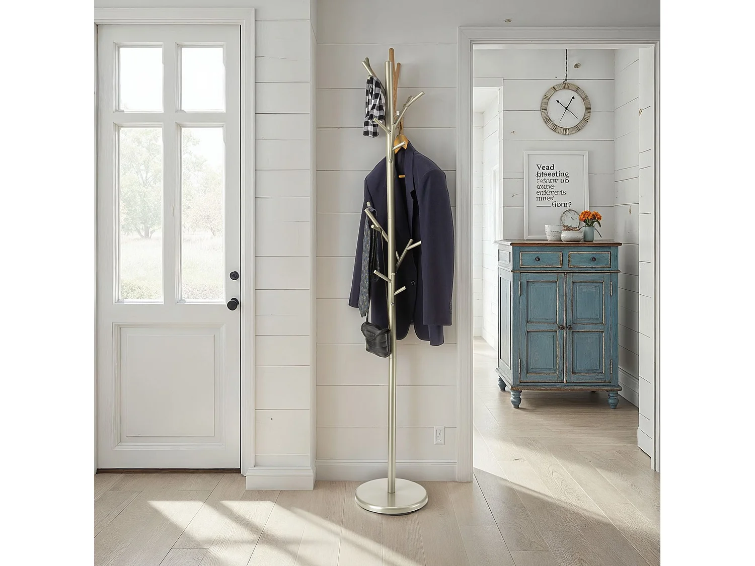 Portemanteau ZENO en métal coloris champagne portant à vêtements sur pied en forme d'arbre avec 6 crochets sur différentes hauteurs