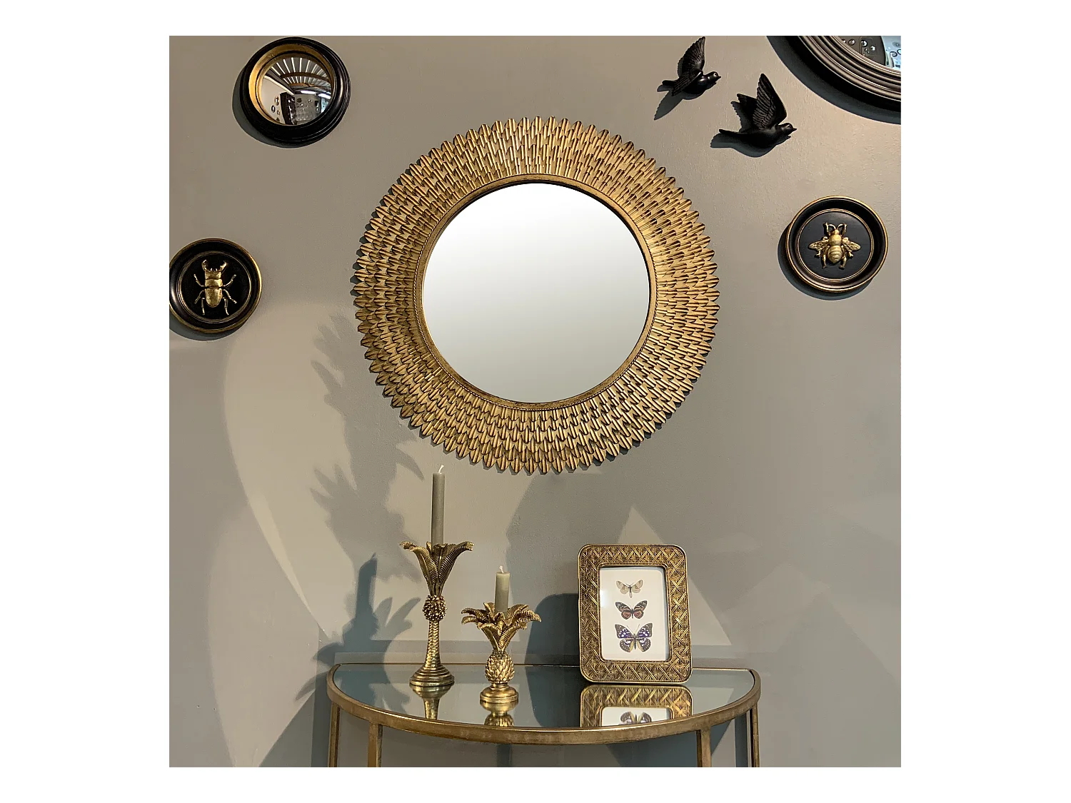 Miroir rond plumes métal doré patiné 76cm