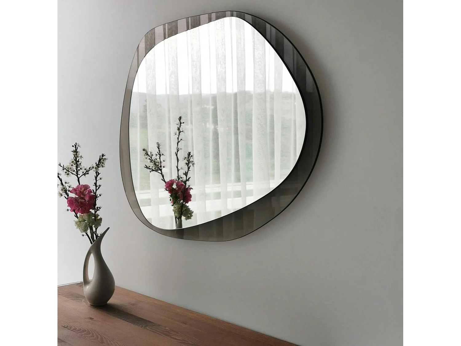 Miroir design organique cadre verre ambré 75 cm CODY