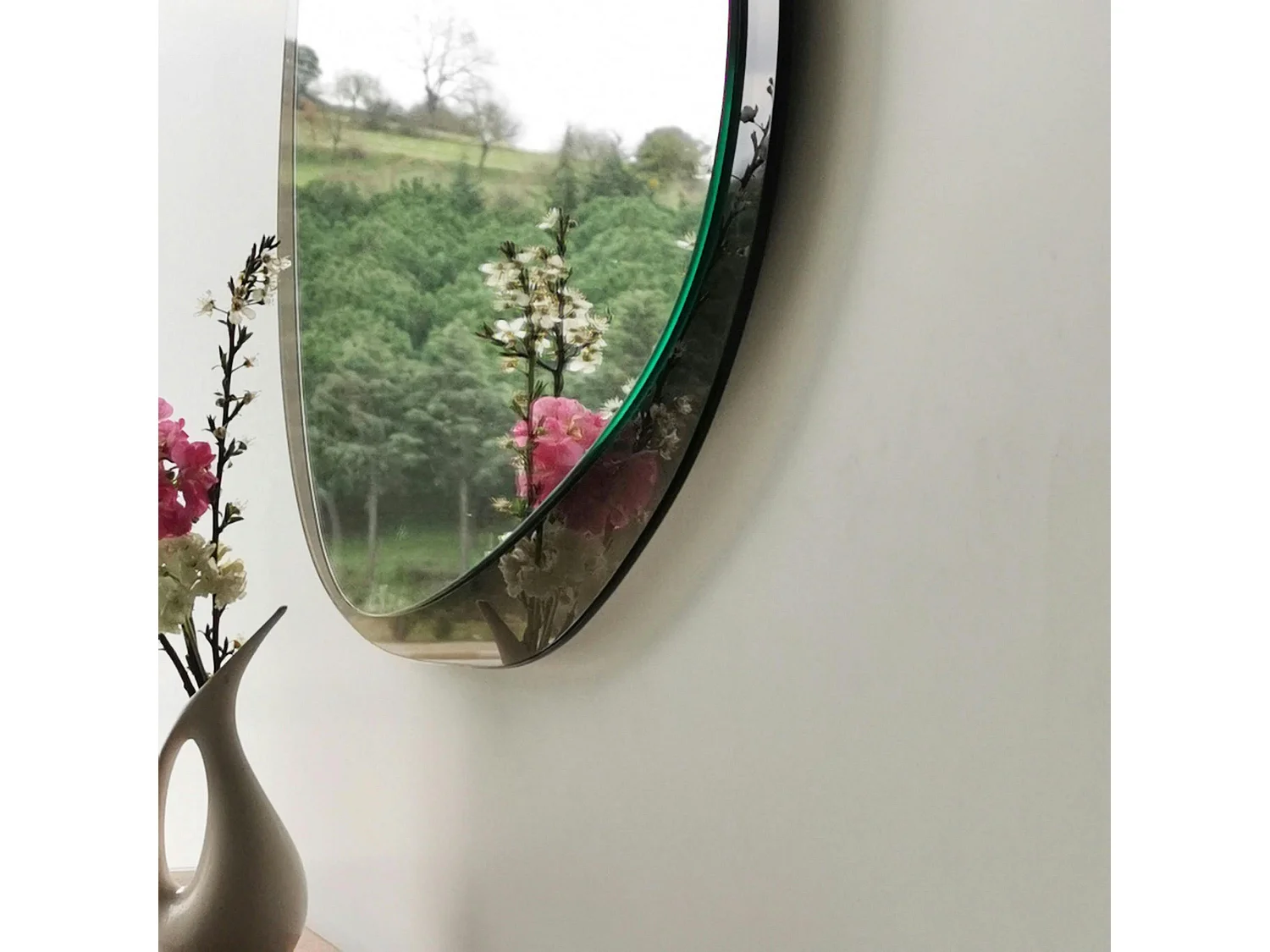 Miroir design organique cadre verre ambré 75 cm CODY