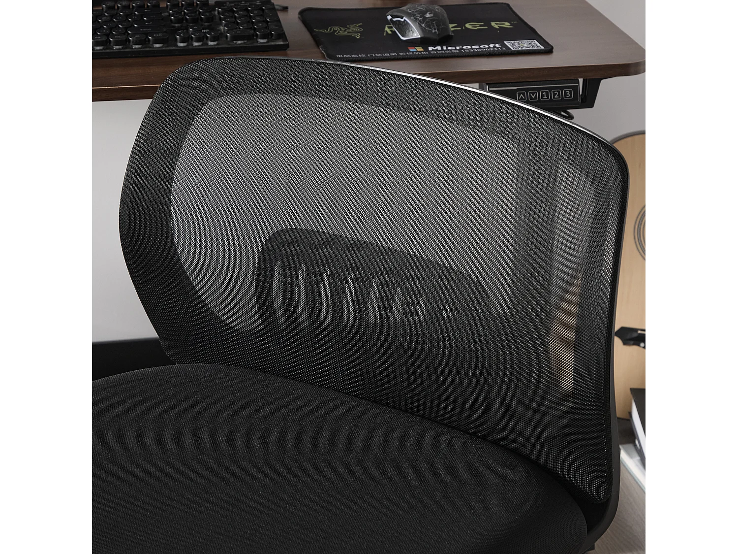 Fauteuil pivotant — réglable en hauteur — mesh noir respirant — dossier ergonomique