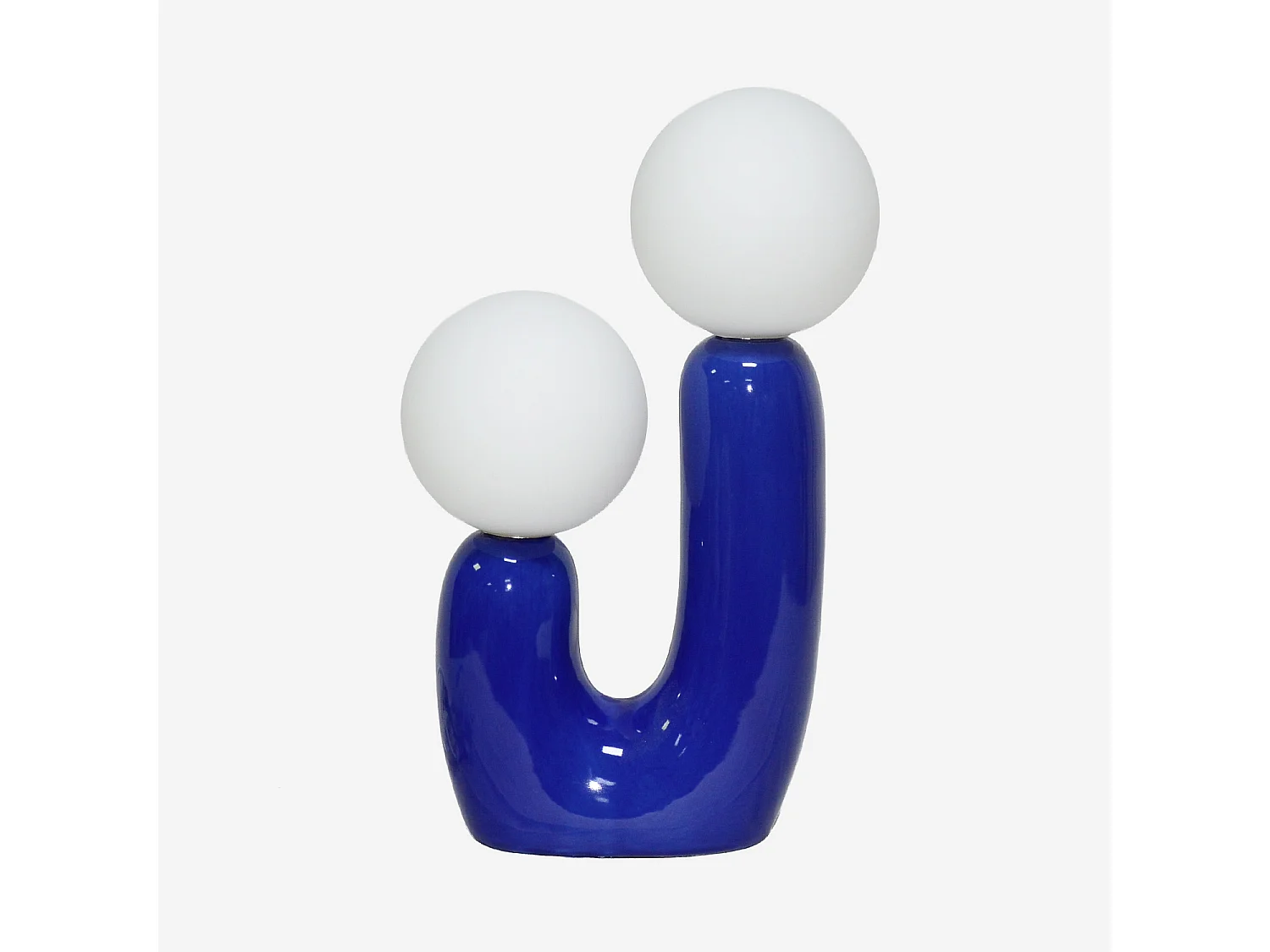 Lámpara de mesa orgánica de cerámica y vidrio azul
