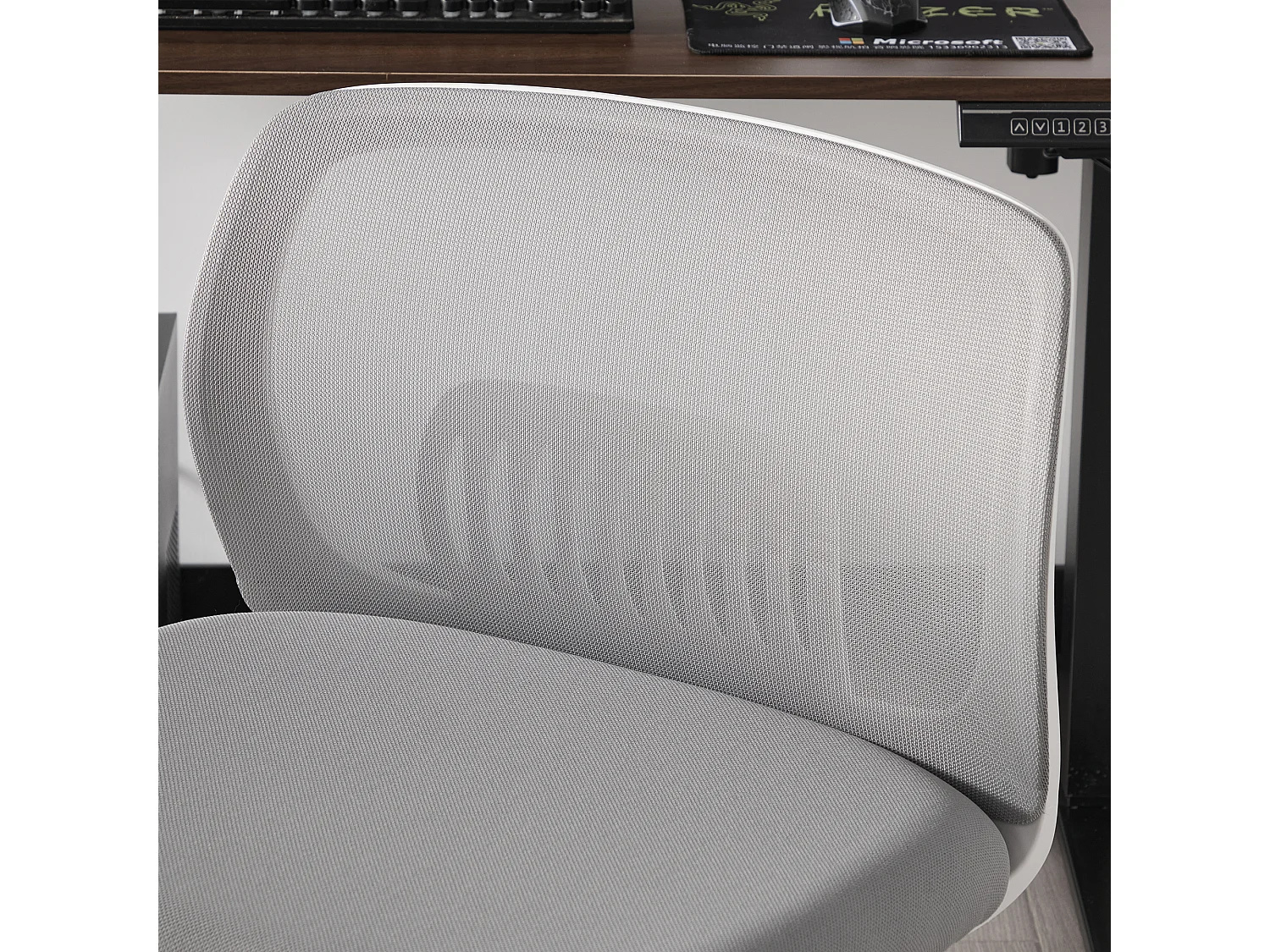 Fauteuil pivotant — réglable en hauteur — mesh gris respirant — dossier ergonomique