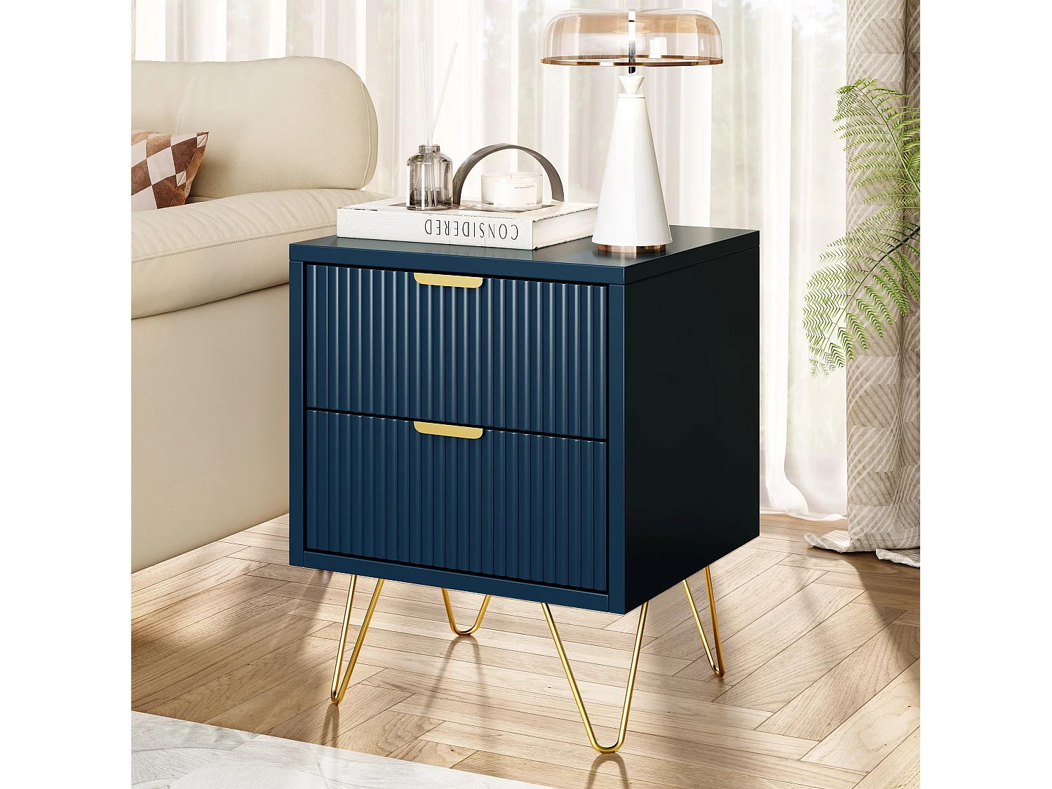 Mesita de noche moderna azul con dos cajones y patas doradas: diseño elegante y funcional.
