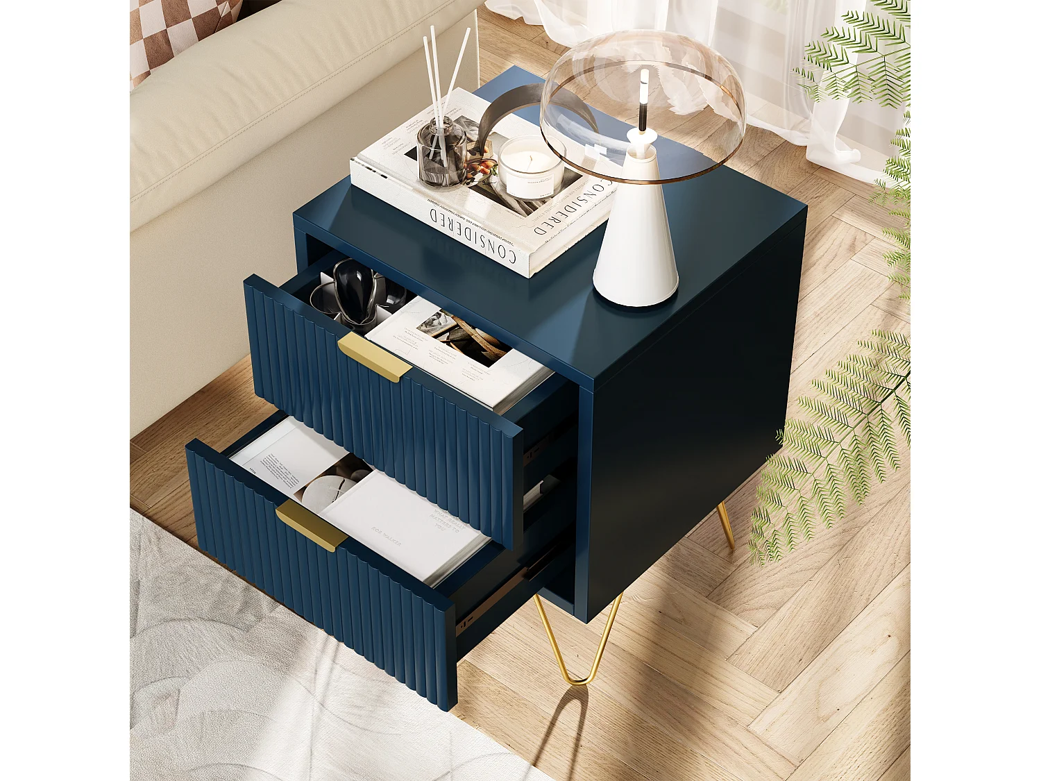 Mesita de noche moderna azul con dos cajones y patas doradas: diseño elegante y funcional.