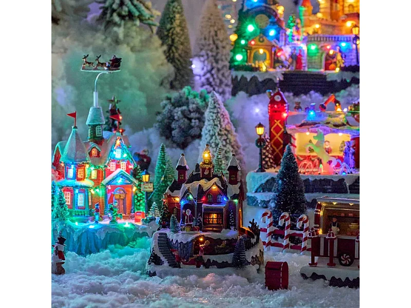 Village de Noël lumineux, animé et musical  Maison du Père Noël avec train