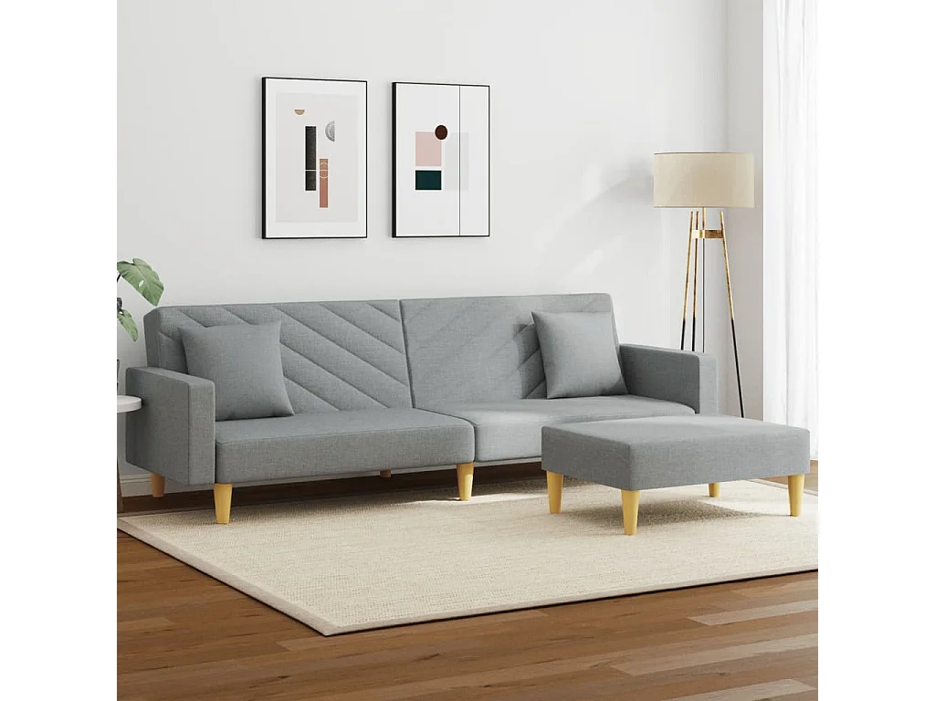 Sofá cama de 2 plazas con almohadas y reposapiés en gris claro