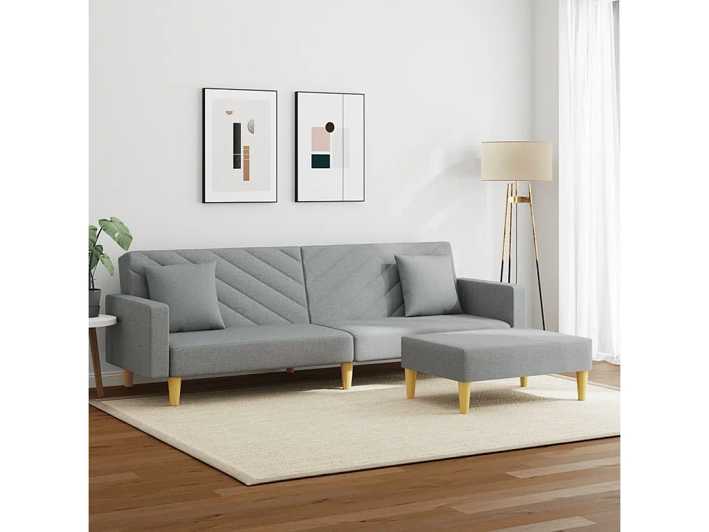Sofá cama de 2 plazas con almohadas y reposapiés en gris claro