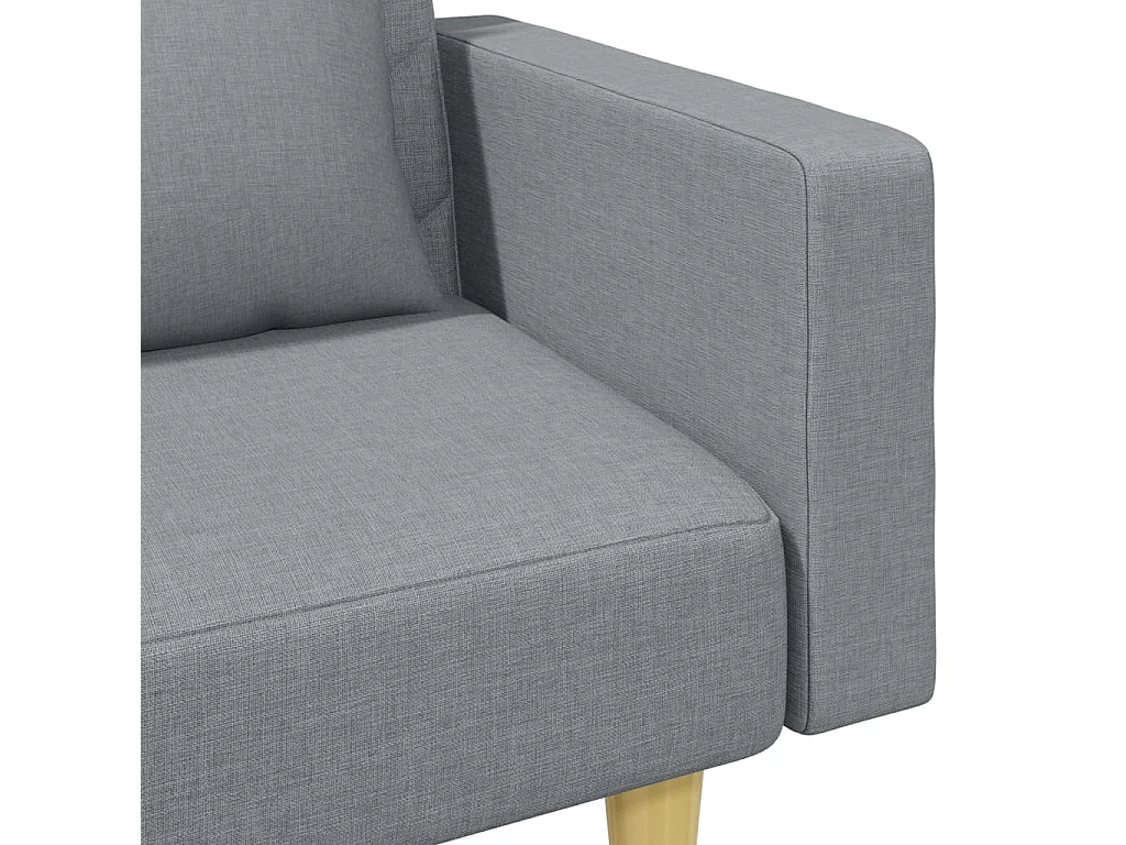 Sofá cama de 2 plazas con almohadas y reposapiés en gris claro