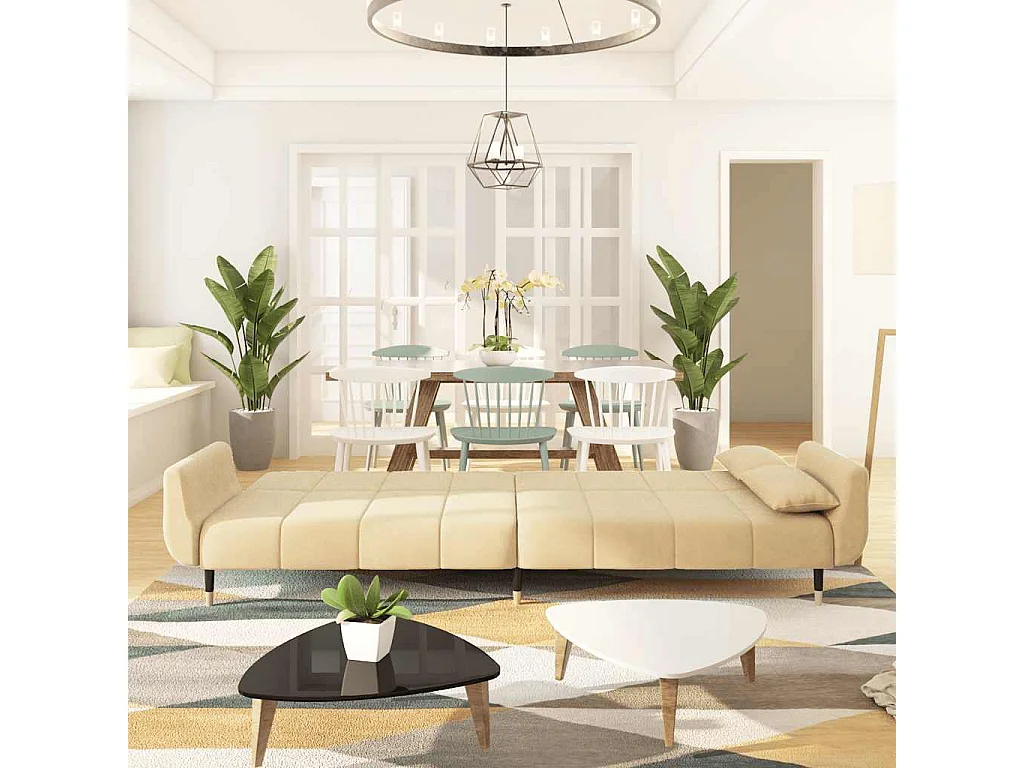 Sofá cama doble con dos almohadas de terciopelo color crema