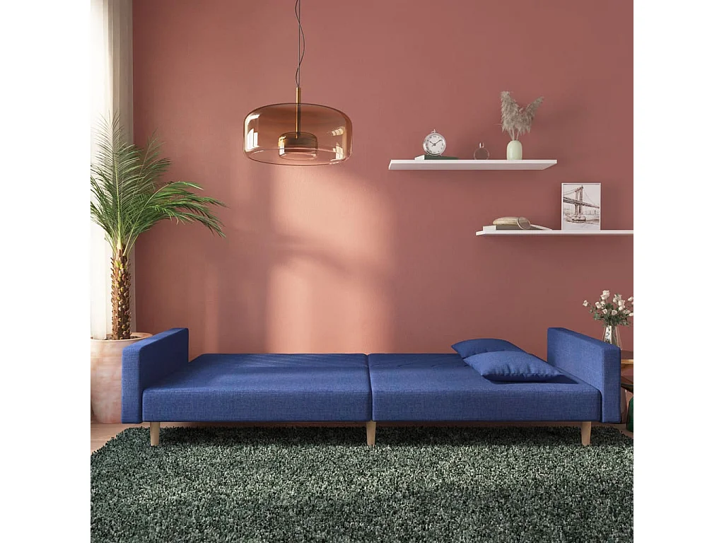 Sofá cama de 2 plazas con dos almohadas de tela azul