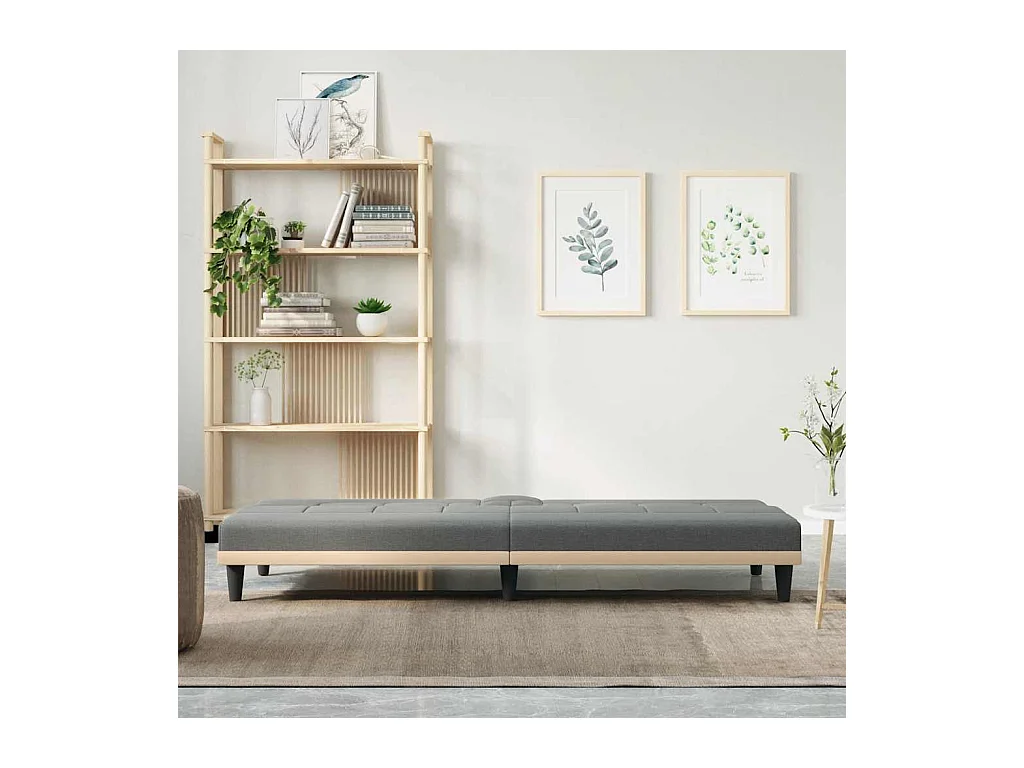 Sofá cama de tela gris oscuro con portavasos