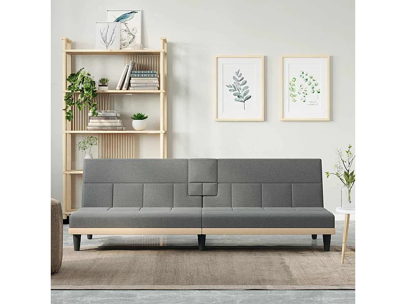 Sofá cama de tela gris oscuro con portavasos