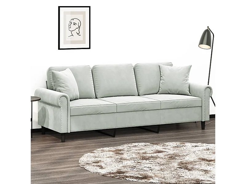 Sofá de 3 plazas con cojines gris claro de terciopelo de 180 cm.