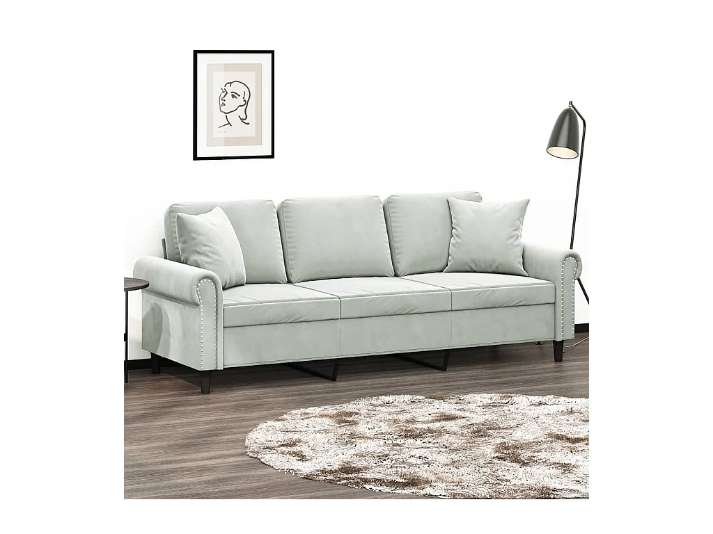 Sofá de 3 plazas con cojines gris claro de terciopelo de 180 cm.
