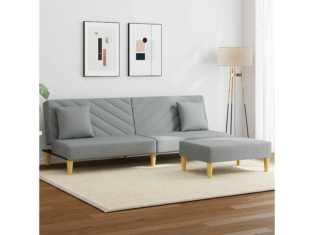 Sofá cama de 2 plazas con almohadas y reposapiés en gris claro