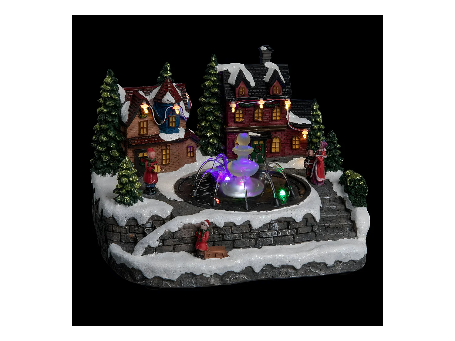 Village de Noël lumineux et mouvement d'eau Scène de vie autour d'une fontaine
