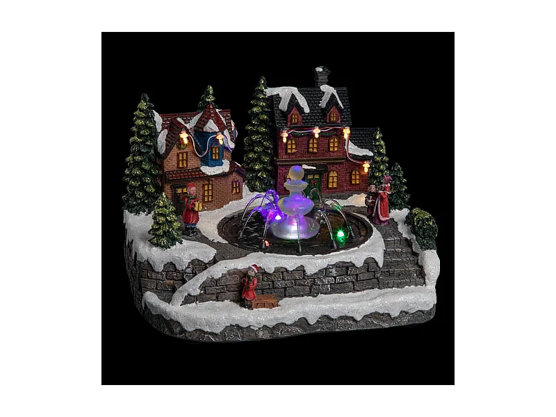 Village de Noël lumineux et mouvement d'eau Scène de vie autour d'une fontaine