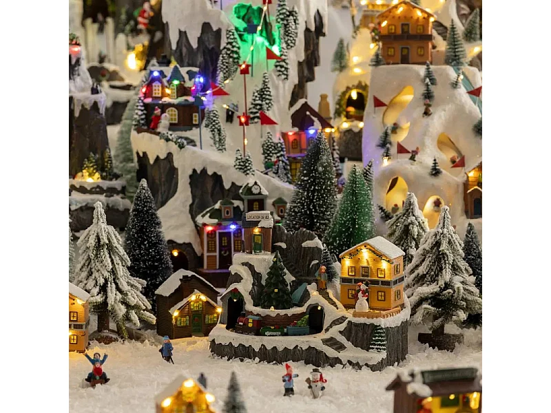 Village de Noël lumineux, animé et musical Scène de vie autour du Chalet à la montagne