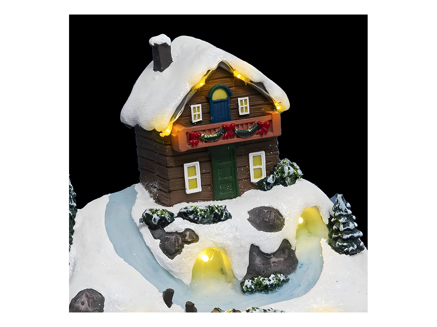 Village de Noël lumineux, animé et musical Vacances à la montagne