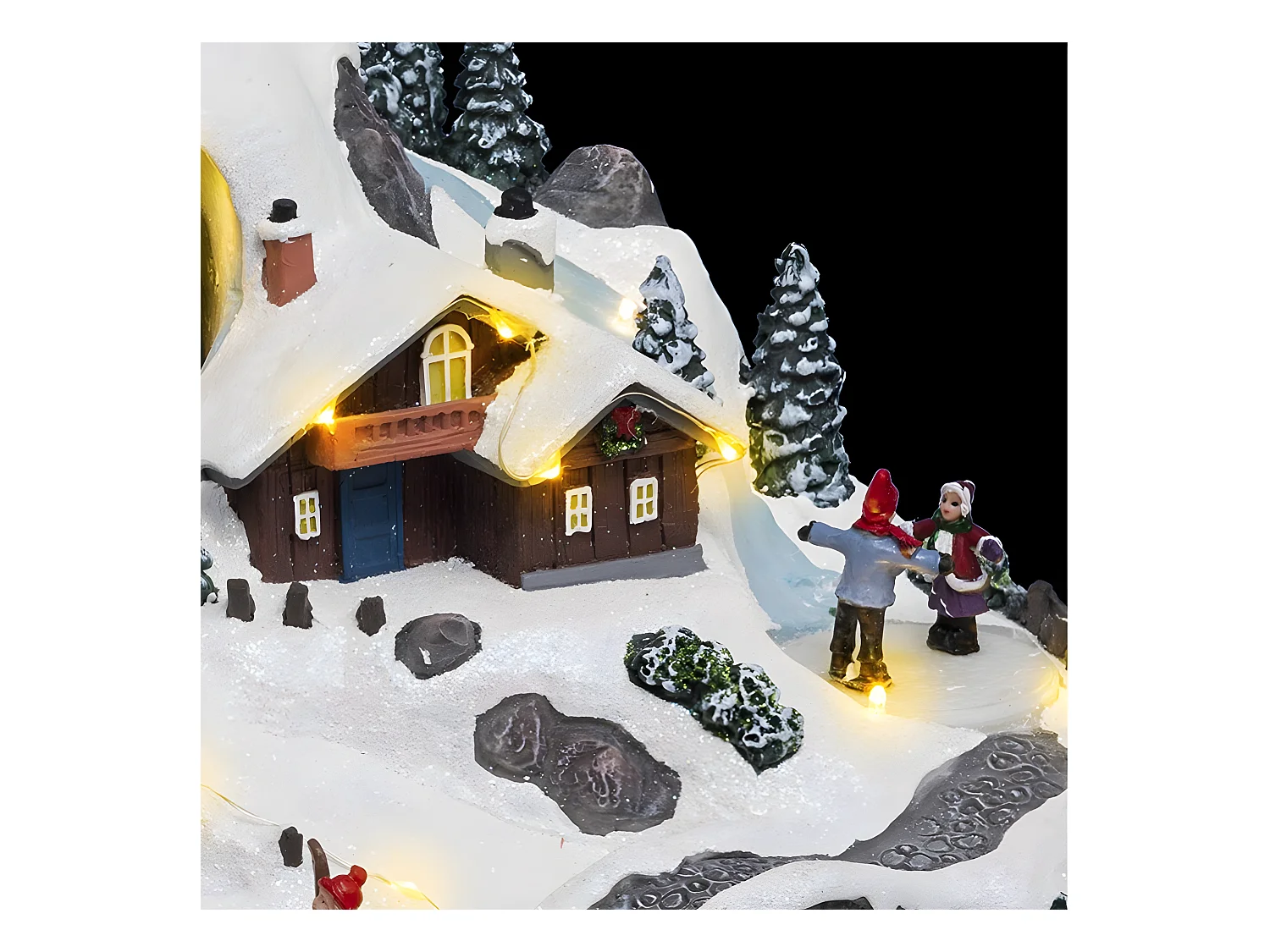 Village de Noël lumineux, animé et musical Vacances à la montagne