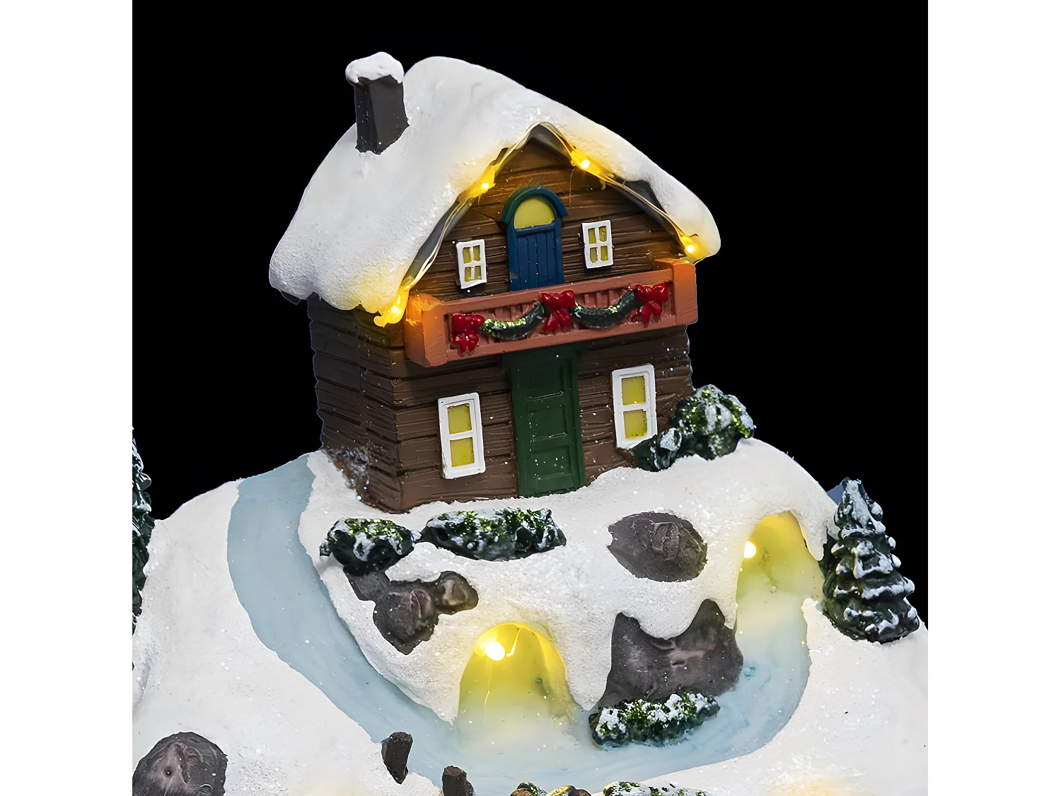 Village de Noël lumineux, animé et musical Vacances à la montagne