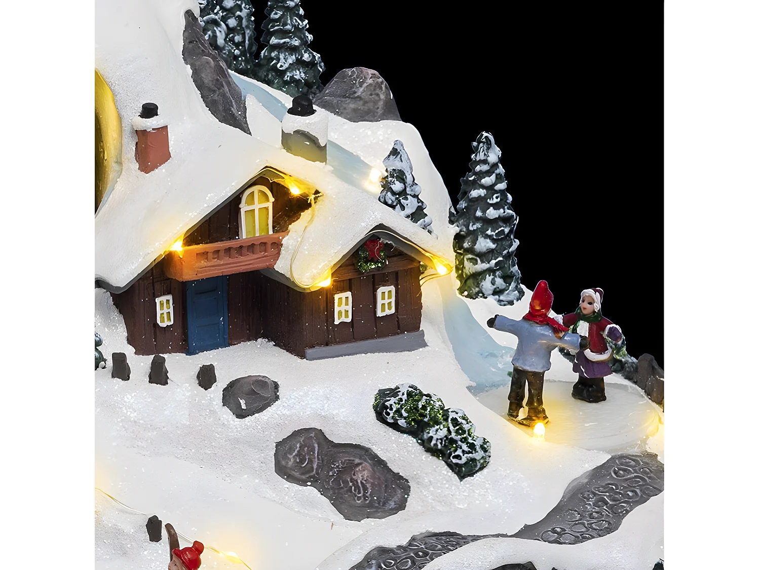 Village de Noël lumineux, animé et musical Vacances à la montagne
