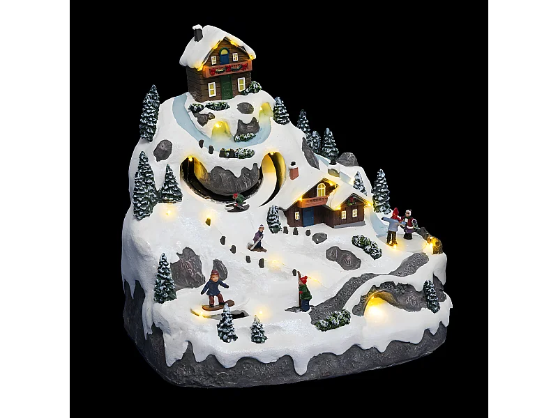 Village de Noël lumineux, animé et musical Vacances à la montagne