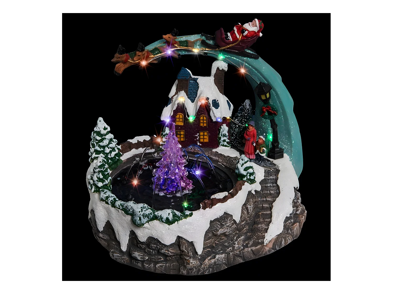 Village de Noël lumineux, animé et musical Scène de vie autour d'une fontaine