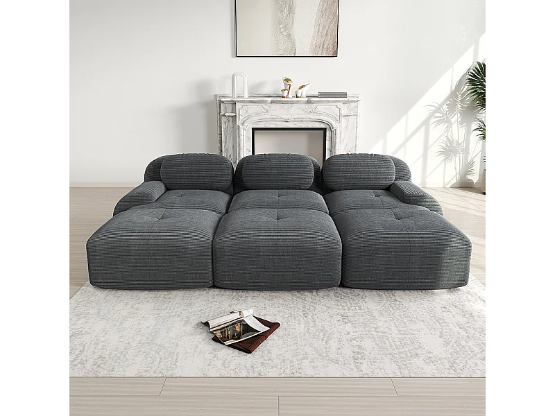 Modulaire driezitsbank met drie voetensteunen van corduroy, extra brede armleuningen, veerkrachtige 32D-vulling, grijs.