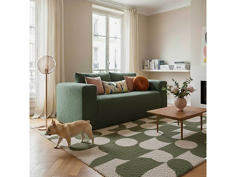 2-zitsbank in bouclé met groene kussens