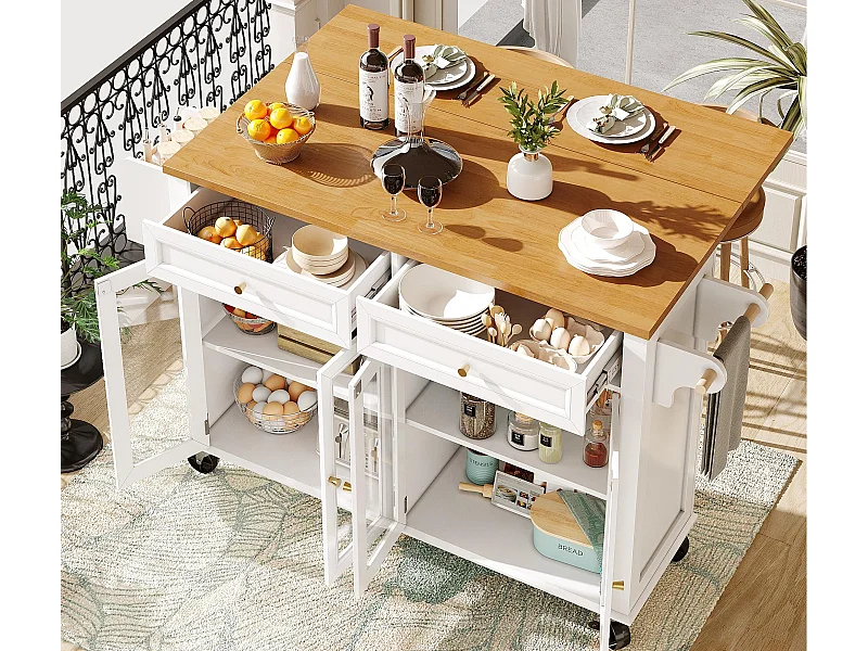 Mobile zentrale Kücheninsel - Ausziehbare Arbeitsplatte - 140x72.5x90 cm - 2 Schubladen und 4 Glastüren - mit Handtuchhalter - Weiß