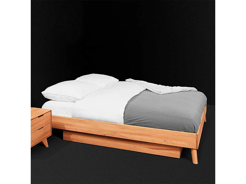 Stauraumbett aus Kernbuche Massivholz modern