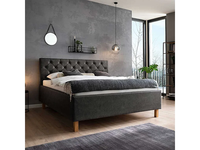 Polster Stauraumbett in Anthrazit Vierfußgestell aus Eiche