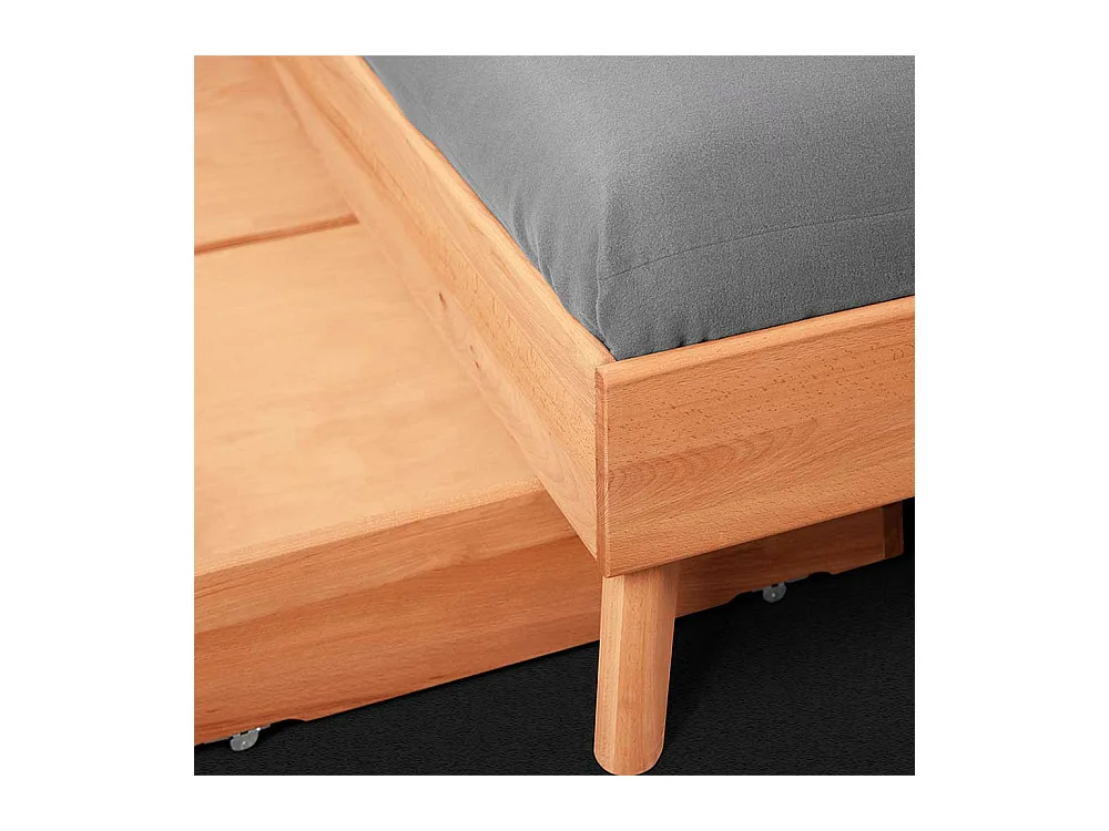 Einzelbett aus Kernbuche Massivholz Schublade