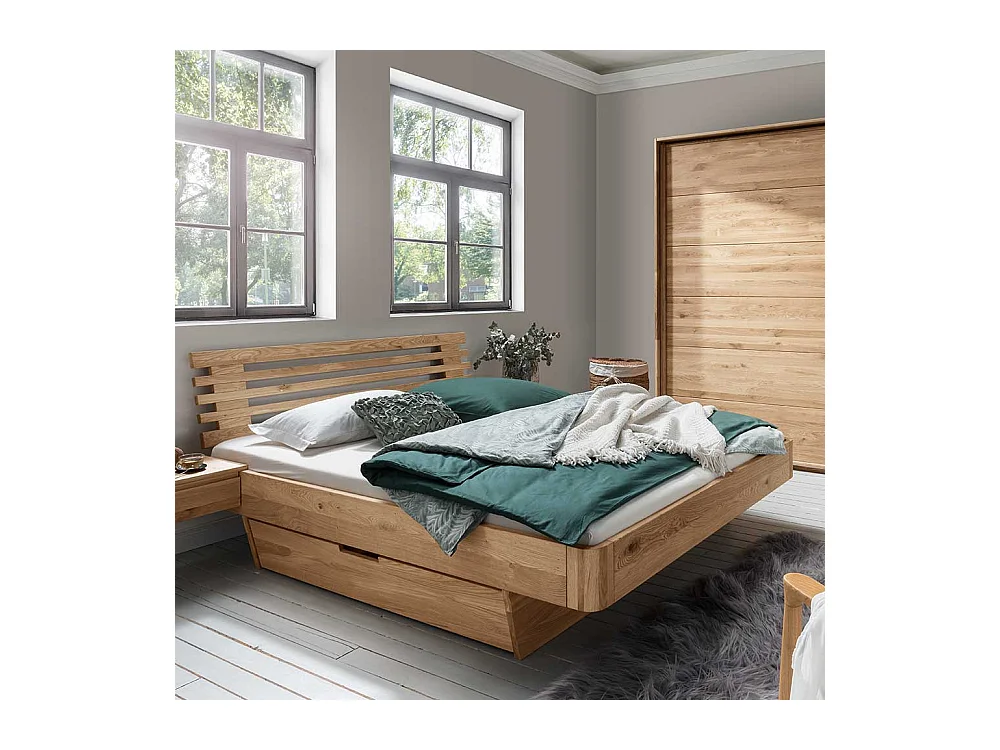 Doppelbett Schubladenbett aus Wildeiche Massivholz auf Schwebesockel