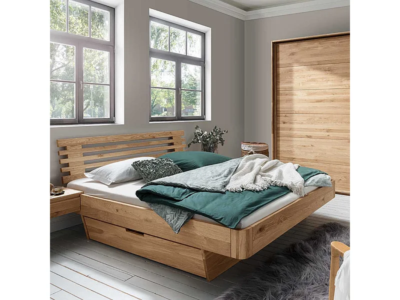 Doppelbett Schubladenbett aus Wildeiche Massivholz auf Schwebesockel