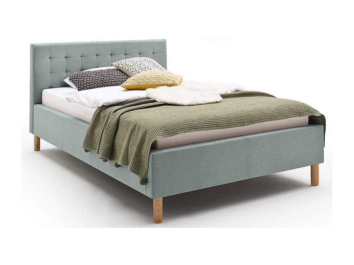 Stoffbett in Hellblau gestepptem Kopfteil