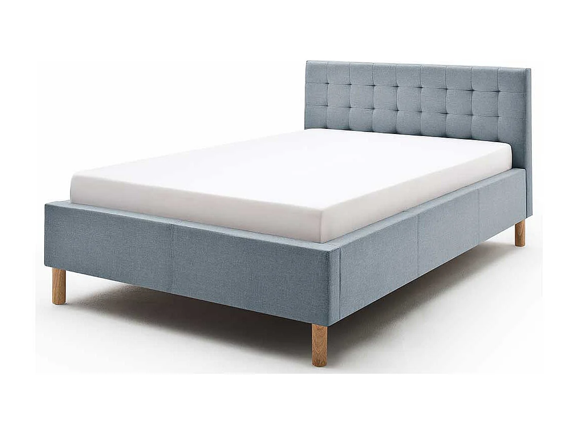 Stoffbett in Hellblau gestepptem Kopfteil