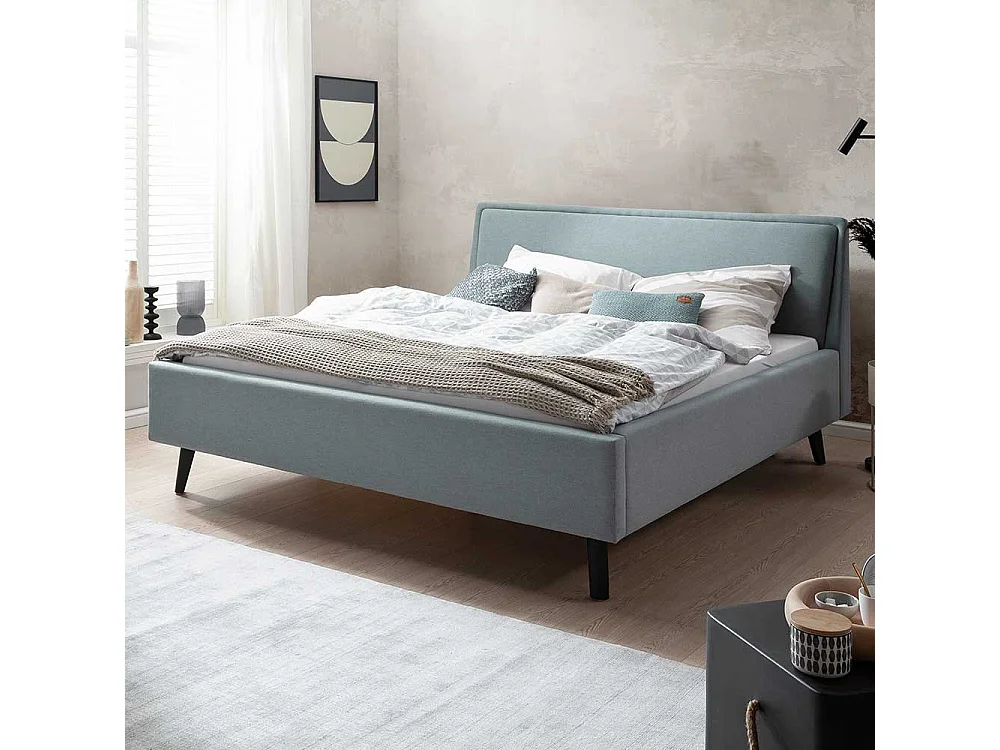 Modernes Polster Bett in Hellblau Vierfußgestell aus Holz