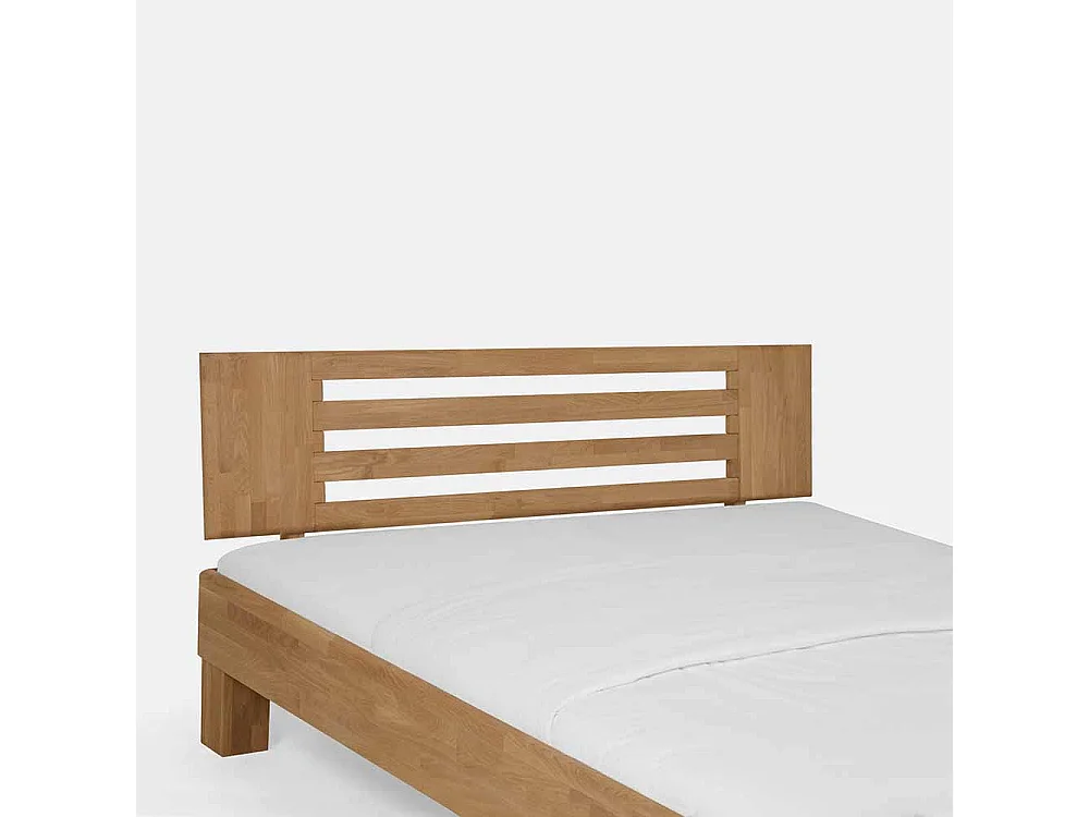 Massivholzbett aus Wildeiche honigfarben geölt mit überlänge
