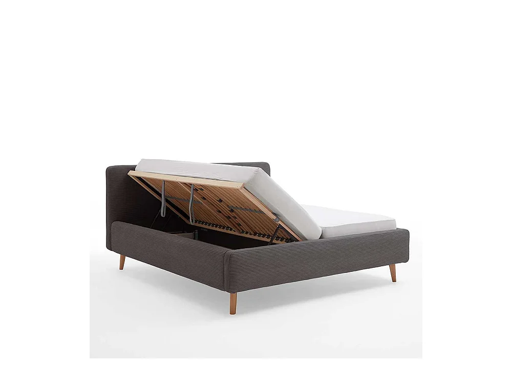 Graues Polsterbett mit Cord Bezug Vierfußgestell aus Holz