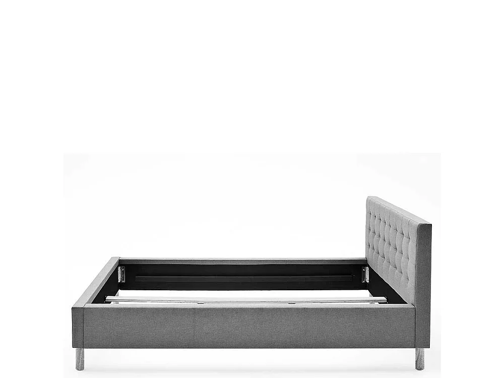 Stoffbett in Hellblau gestepptem Kopfteil