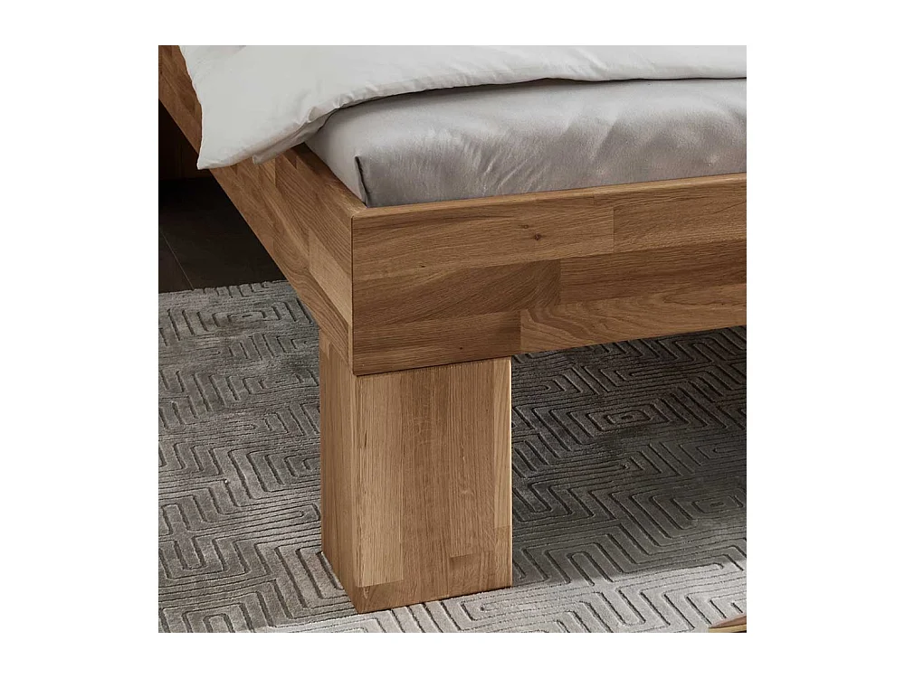 Echtholzbett mit Kopfpolster aus Wildeiche Massivholz geölt