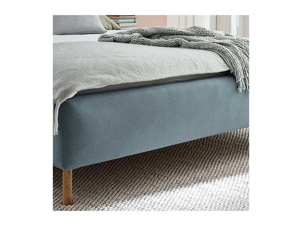 Gepolstertes Bett in Hellblau Webstoff modern