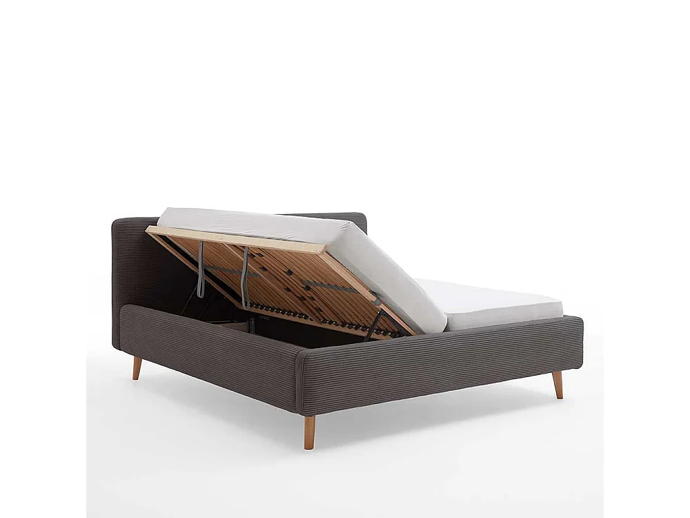 Graues Polsterbett mit Cord Bezug Vierfußgestell aus Holz