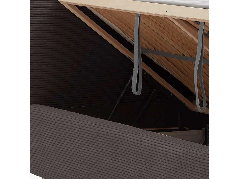 Graues Polsterbett mit Cord Bezug Vierfußgestell aus Holz