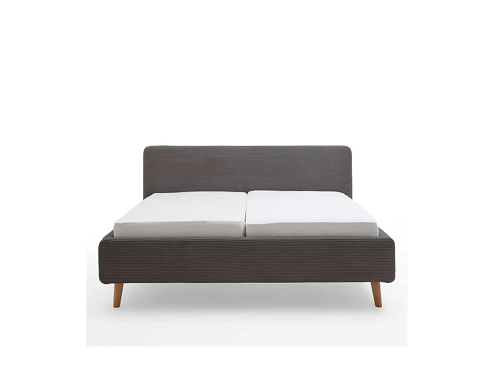 Graues Polsterbett mit Cord Bezug Vierfußgestell aus Holz